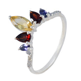 Leah multicolor crown gemstone ring with red, yellow, blue, and purple stones in silver setting